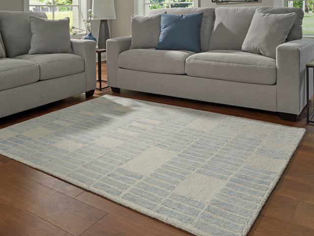 Furniture City Biloxi - Ashley Furniture - Dylanton Rug - 5' x 7' Area Rug / Ivory/Blue - R407812