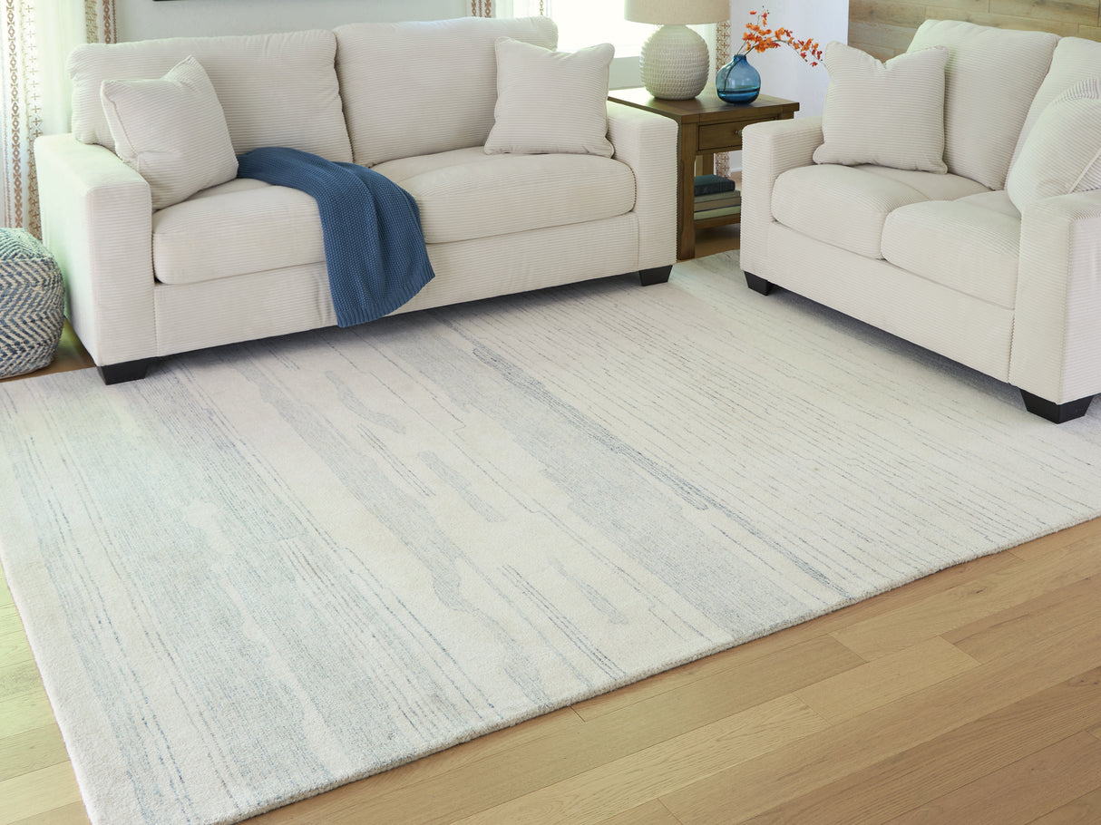 Furniture City Biloxi - Ashley Furniture - Genemost Rug - 7'8" x 10' Area Rug / Ivory/Blue - R407841