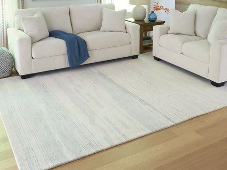 Furniture City Biloxi - Ashley Furniture - Genemost Rug - 7'8" x 10' Area Rug / Ivory/Blue - R407841